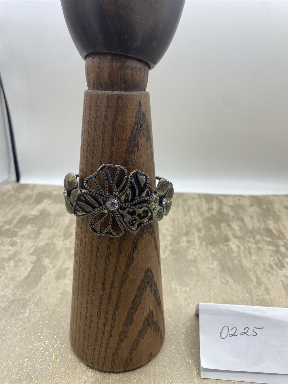 Black Clamper Bracelet Metal 3-Rhinestone Flower Statement